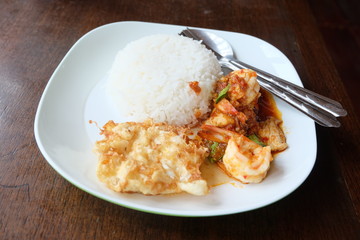 omelette and shrimp spicy with rice