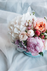 Beautiful spring bouquet with tender flowers in box