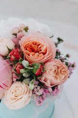 Beautiful spring bouquet with tender flowers in box