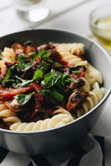 Delicious pasta with tomatoes, mussels and herbs