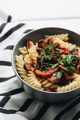Delicious pasta with tomatoes, mussels and herbs