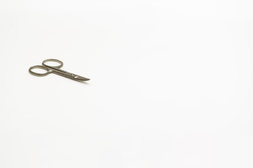 Professional manicure tools on a white background. Manicure scissor. 