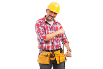 Builder dropping wrench inside pocket.