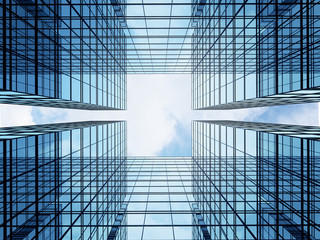 Obraz premium View of high rise glass building and dark steel window system on blue clear sky background,Business concept of future architecture,looking up to the sun light on the top of building. 3d render