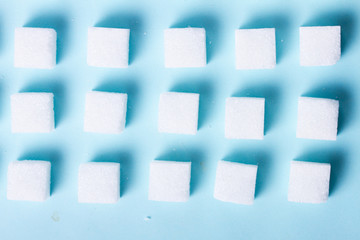 Sugar on blue background