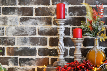 Richly decorated for Christmas with red and gold ornaments and lights on the background of an old piano. Elegant card. closeup. copy spase