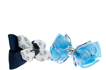 blue and black bow hair bands on white isolated background