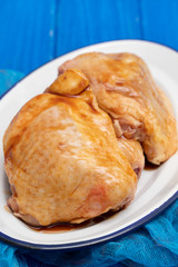 chicken with marinate on dish