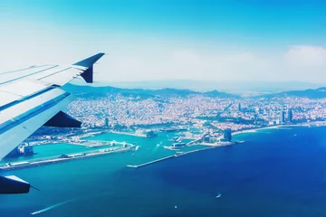 Foto op Plexiglas Landing in Barcelona, Spain, Catalonia. Traveling by air. View from airplane window. © tiana__lima__