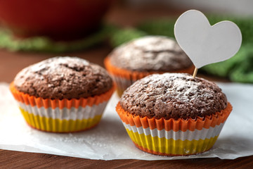 Chocolate muffin with a white heart.