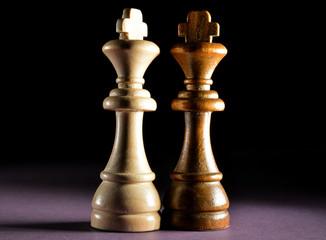 chess pieces on black background	