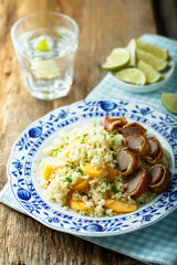 Couscous salad with orange and bacon
