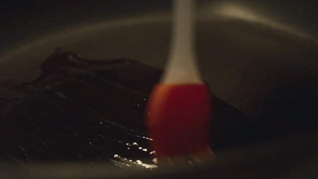 brush the butter on the pan