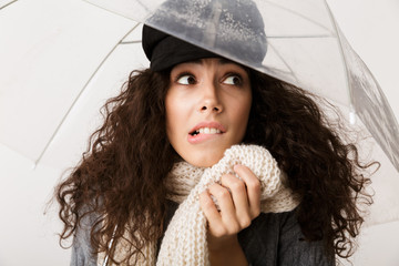 Attractive young woman wearing autumn clothes