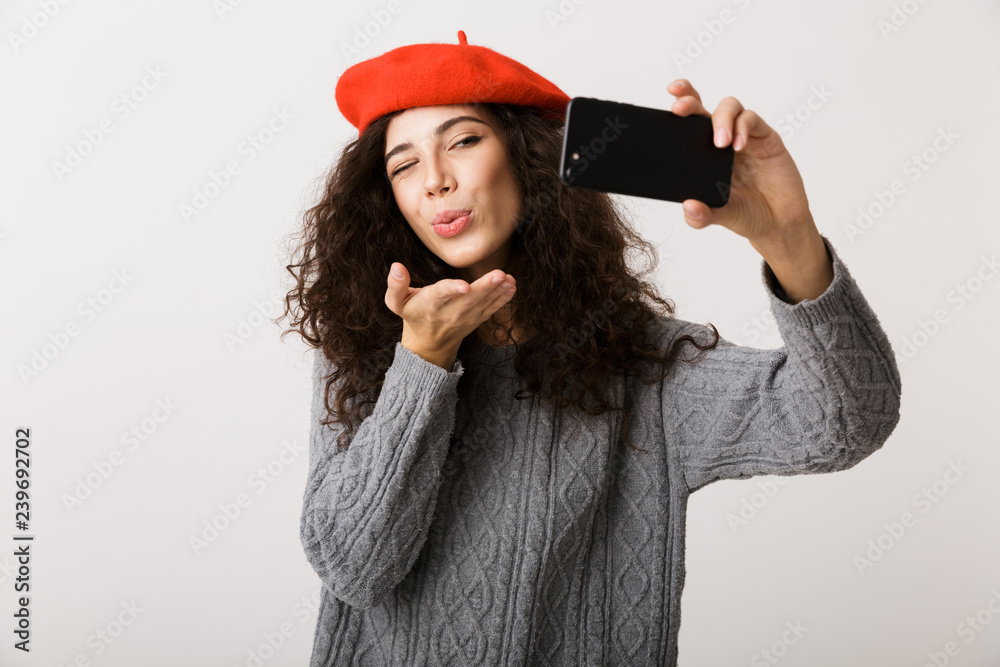 Wall mural excited young woman wearing autumn clothes