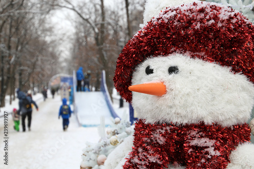 Snowman On Winter Street Christmas Decorations In The City