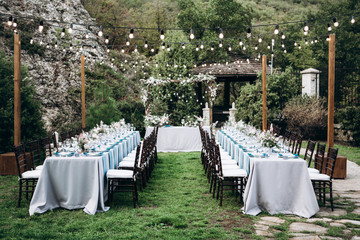 Wedding table decoration in rustic style. Wedding flowers.