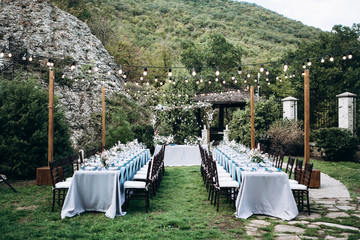 Wedding table setting and decoration. Flowers.