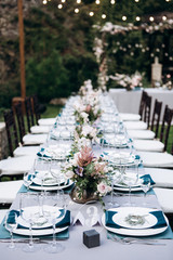 Wedding table setting and decoration. Flowers.