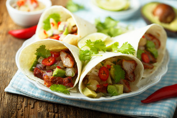 Homemade chicken taco with avocado
