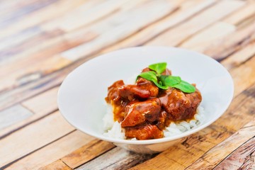 Asian style caramel pork with rice and vegetable