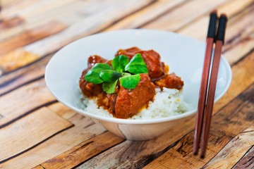 Asian style caramel pork with rice and vegetable