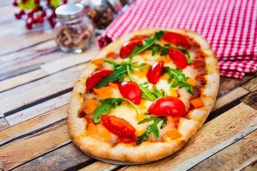 pizza with mozzarella, emmental and cheddar cheese