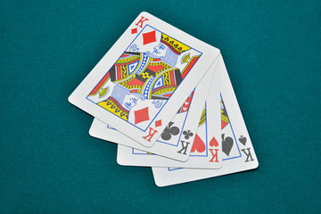 playing cards on green background