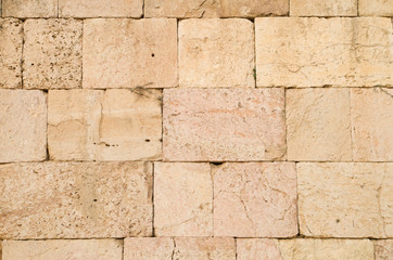 Old relief limestone wall closeup