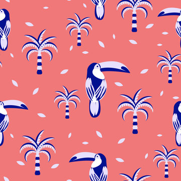Toucan and palms seamless pattern for fabric trendy print. Tropical parrot bird on coral print fashion background.