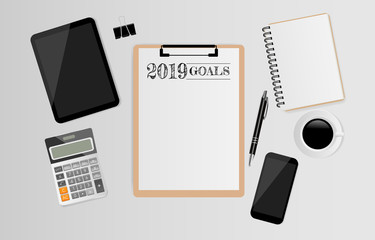 2019 goals text on white paper with office supplies on gray background. Vector illustration