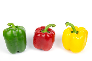 Three bell peppers on white background