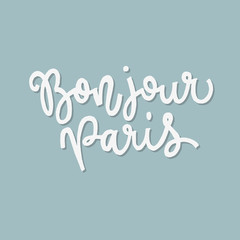 Inspirational quote bonjour Paris. Hand lettering design element. Ink brush calligraphy. © suvoroff_maxim