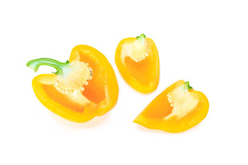 Fototapeta na wymiar yellow bell pepper cut into pieces on white background.