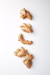 fresh ginger on white background