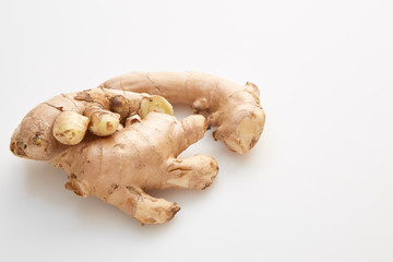 fresh ginger on white background