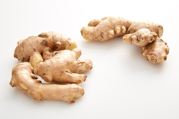 fresh ginger on white background