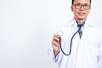 Fototapeta premium Doctor holding stethoscope on white background