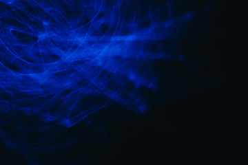 Blue Abstract blurred motion Long exposure on dark background