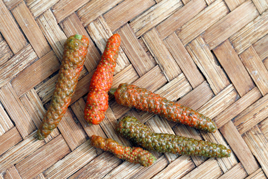 Diadi Long pepper in bamboo basket, Long pepper, Indian long pepper, Javanese long pepper, Piper chaba Hunt (Piperaceae), Diade herbs
