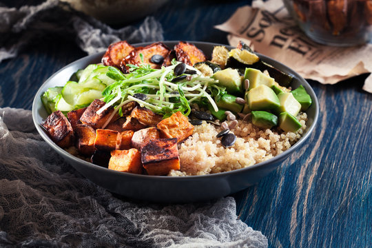 Colorful Buddha Bowl With Quinoa And Roasted And Fresh Vegetables