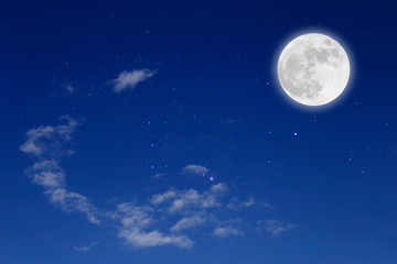 Naklejka na ściany i meble Romantic night with full moon in space over stars with cloudscape background.