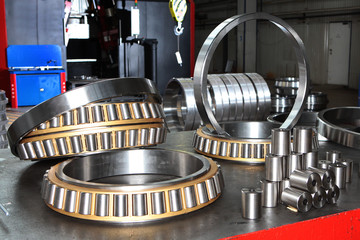 Manufacture of bearings in the factory.The chrome surface of products. Industrial theme. Production...