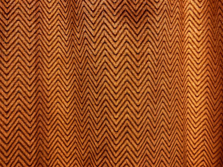background brown zigzag curtain, brown cloth with wave line, zigzag fabric background