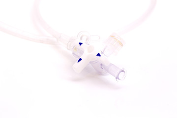 iv stopcock saline control on white isolated background.
