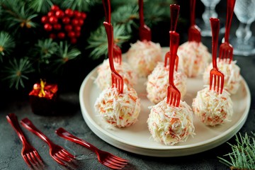 Cheese balls in crab shavings is a traditional Russian snack for Christmas and New Year's party. © chudo2307