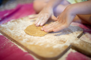 Little girl making cake
