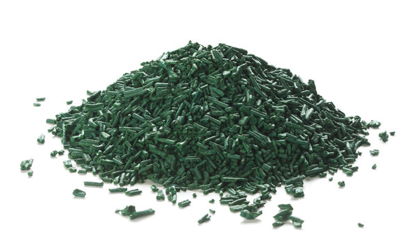 Spirulina Flakes Over White Background