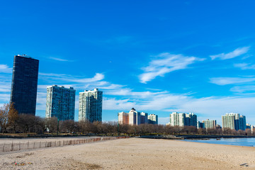 Fototapeta na wymiar Foster Beach in Chicago with the Edgewater Neighborhood Skyline