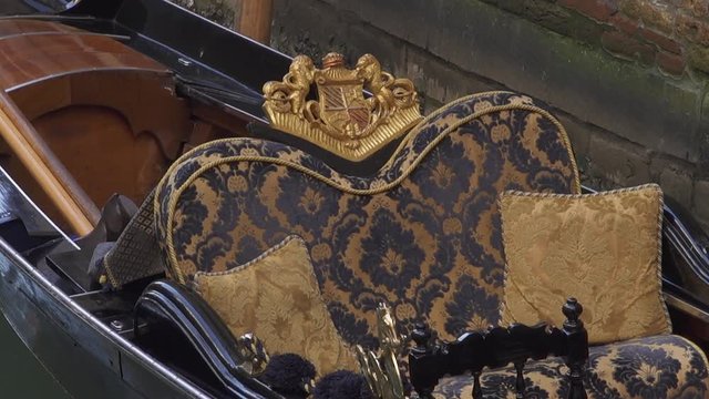 Venice luxurious seat of a gondola on the water